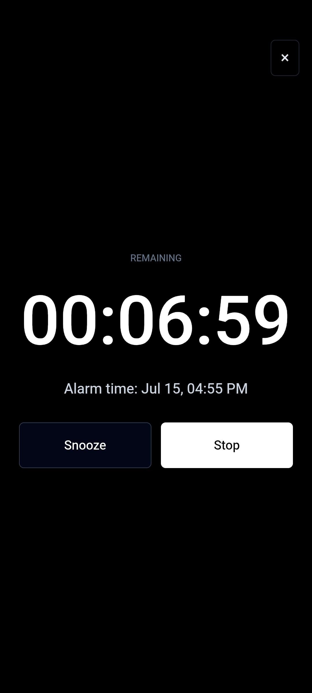 TimerStart alarm screen showing remaining time with Snooze and Stop buttons